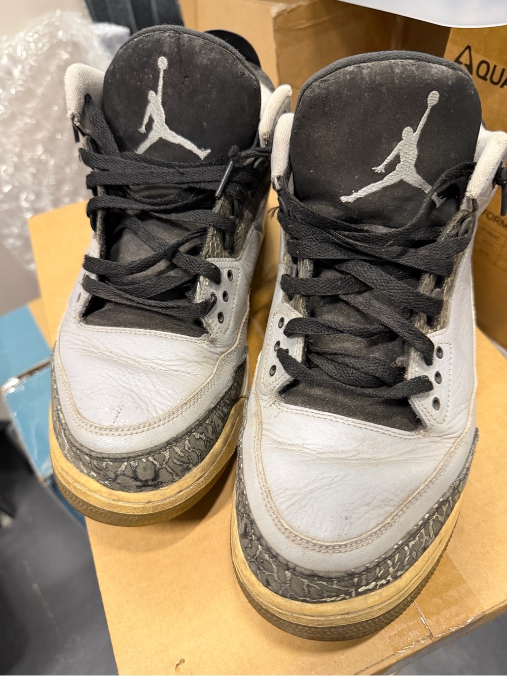 Air Jordans Black and White High-Top Sneakers with Grey Accents
